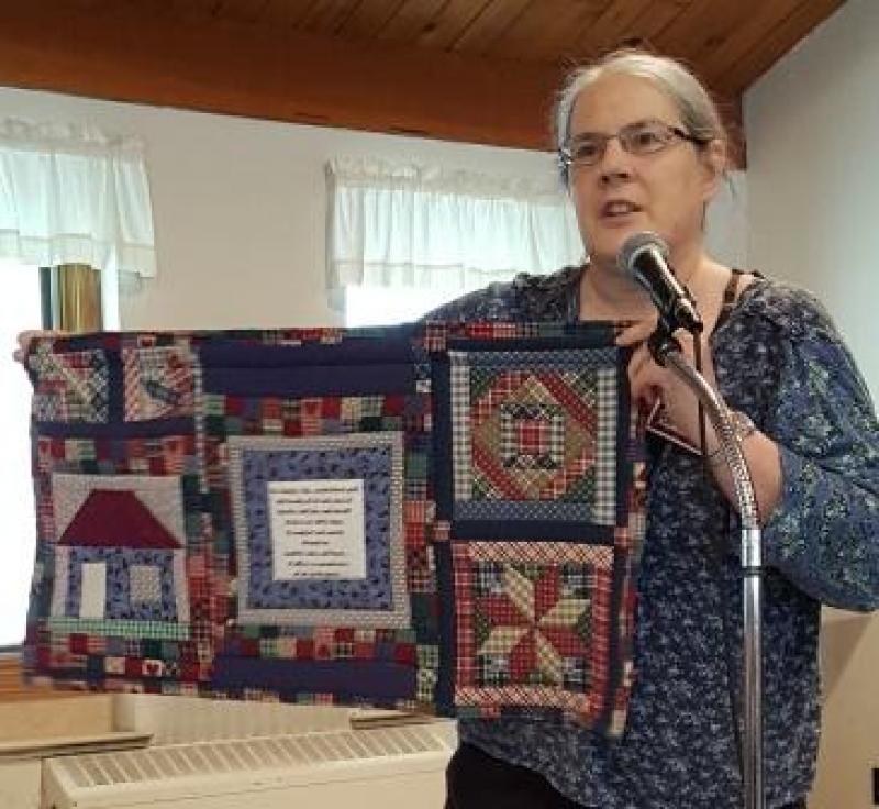Kathy G shows a Home wall hanging